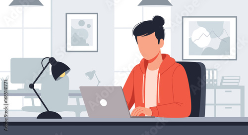 Focused person in a casual red hoodie working on a laptop at a modern office desk. Ideal for remote work, online learning, productivity, and digital lifestyle concepts.
