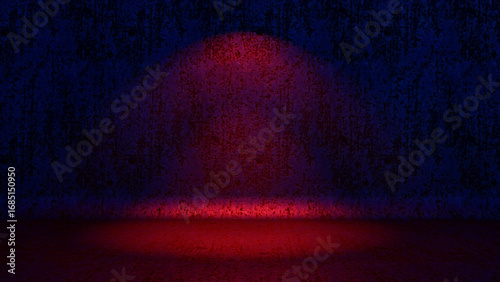 Dark background with a single red spotlight highlighting a small area of the stage