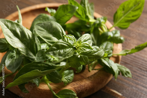 Plate with fresh green basi...