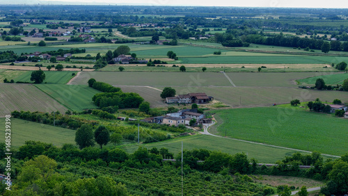 Fotografija Po Valley landscape showing cultivated fields of different colors and farmhouses