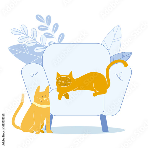 Two cats relaxing on a comfy armchair indoors
