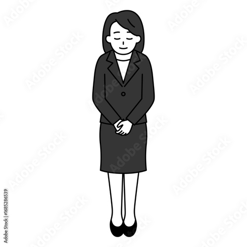 お辞儀をする黒いスーツの女性（全身）