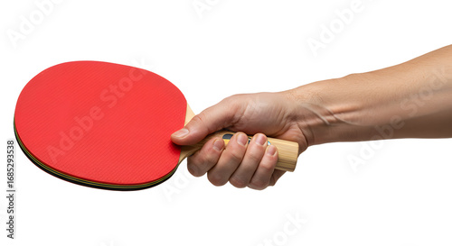 Holding ping pong paddle in hand ready to play game