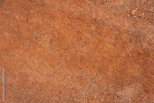 Dirt, terrain or gravel stone road surface pattern in outdoor environmental. Background and textured photo.	