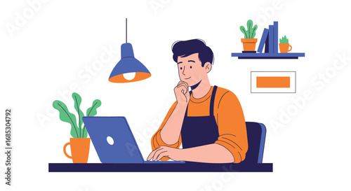 Man working on laptop at a desk with plants and lamp