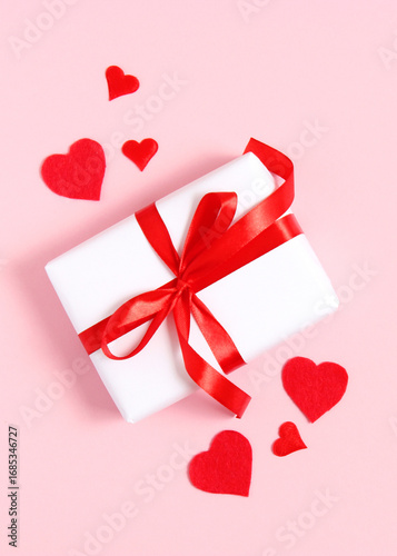 Gifts and hearts on a colored background top view. Love.. Vertical photo format