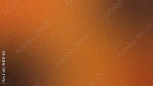 Abstract autumn gradient background with grain texture. Brown and orange blurry fall backdrop with noise effect - stock photo