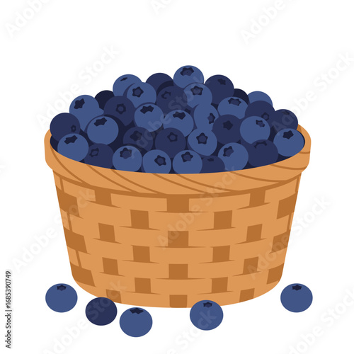 A full woven basket overflowing with ripe fresh blueberries with several scattered around the base on a white background