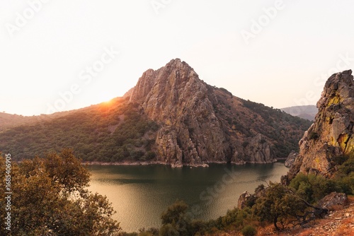Konstfotografi Sunset over the Salto del Gitano cliffs in Monfragüe National Park, Cáceres, Spain