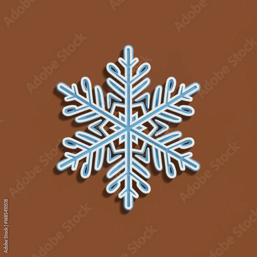 A stylized, blue and white snowflake with intricate crystalline patterns, casting a subtle shadow on a warm brown background.