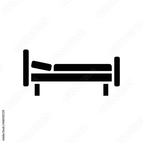 Simple black icon of a bed with a pillow