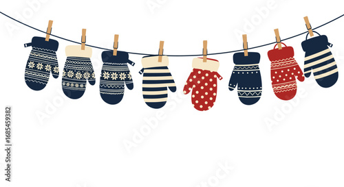Cozy knitted mittens hanging on a clothesline for a warm winter day