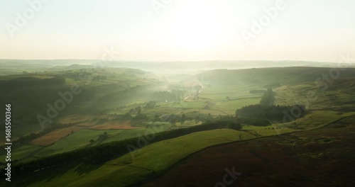 Flying over misty Swaledale at sunrise