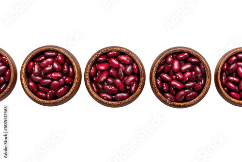 Four wooden bowls of red beans, top view