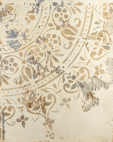 Vintage wallpaper with intricate floral patterns, showcasing faded colors and textures, creating a nostalgic atmosphere in a historical setting with artistic details