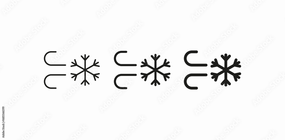 blowing wind snowflake icon sign vector