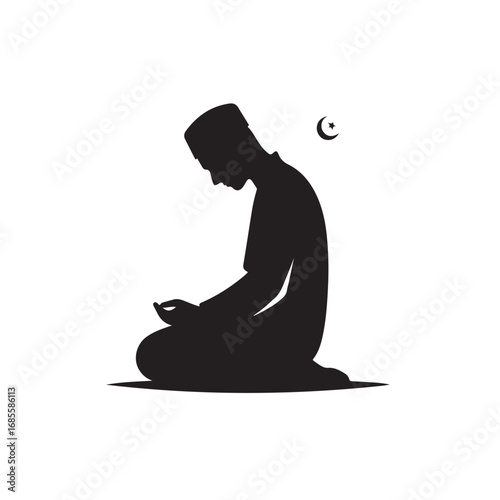 Man performing islamic prayer in a dark silhouette