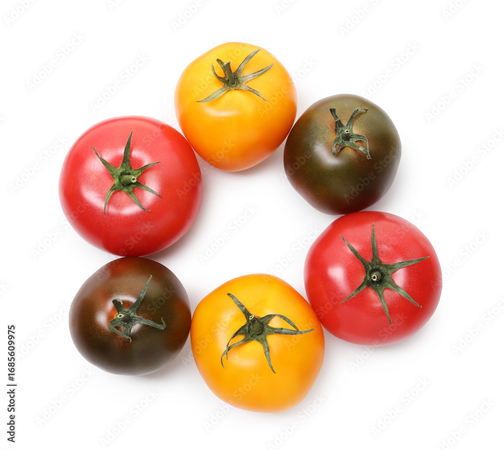 Fototapeta premium Different ripe juicy tomatoes isolated on white, top view