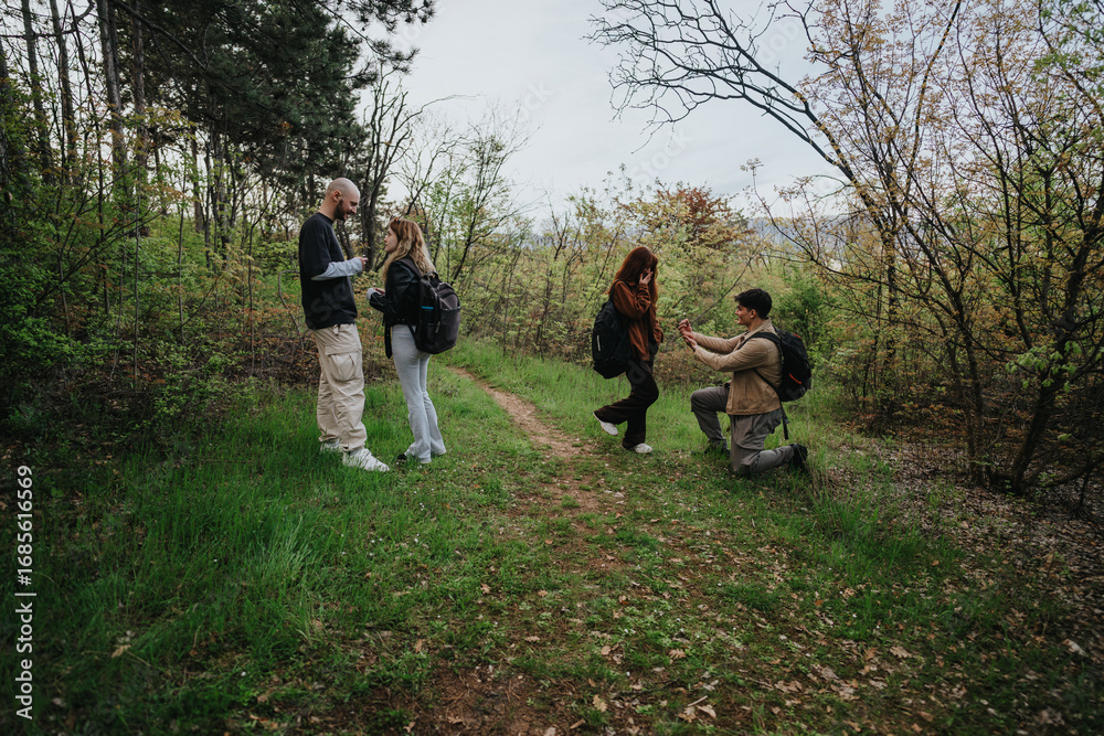 Obraz premium In a serene forest, two couples share a day of hiking, and one experiences a moving marriage proposal on a sunlit path surrounded by lush greenery.