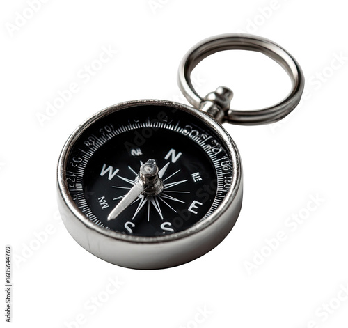 Close-up of a small, silver-toned compass