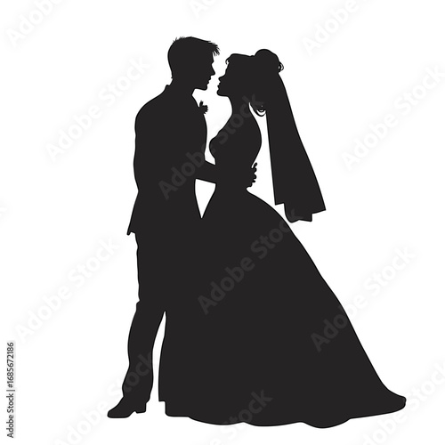 Silhouette of bride and groom embracing in a romantic moment  