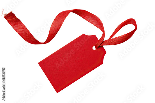 A vibrant red tag, tied with a crimson ribbon, against a black background. The tag is rectangular and has a small hole for hanging. The ribbon drapes diagonally, with a frayed edge visible