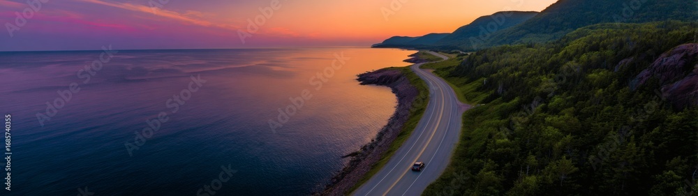 Fototapeta premium Serene Coastal Road at Sunset with Vintage Car Driving Towards Horizon, Evoking Freedom and Timeless Journey