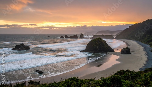 Dramatic sunset over a rugged coastline with waves crashing against rocks