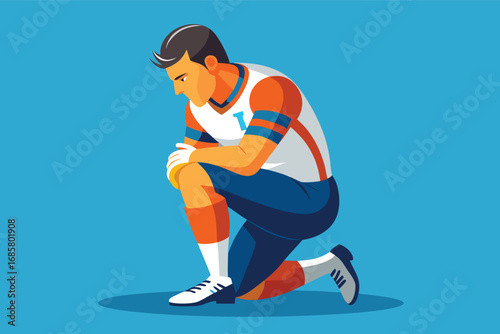 Football player kneeling in reflection after a game on a sunny day