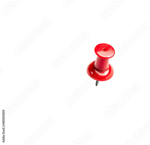 A single red pushpin against a black background.  Close-up view of the pinhead and point