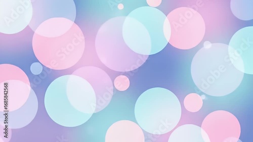 Soft pastel bokeh circles floating in dreamy abstract background