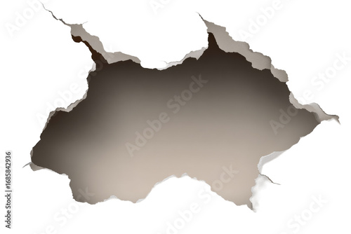 A ragged hole punched through a dark gray surface