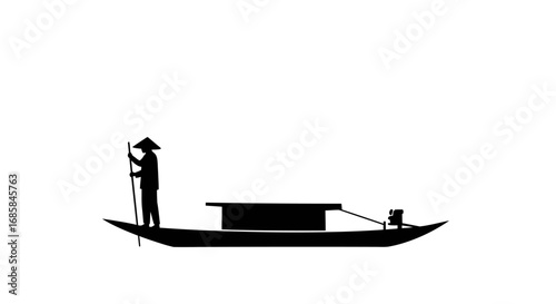 Silhouette of a lone fisherman wearing a conical hat standing on a traditional boat with a simple cabin structure