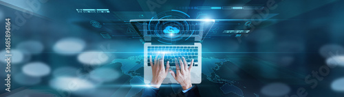 Data recovery, disaster protection. Businessman using laptop with cloud storage, redundancy systems, backup scheduling, encryption methods, file restoration.