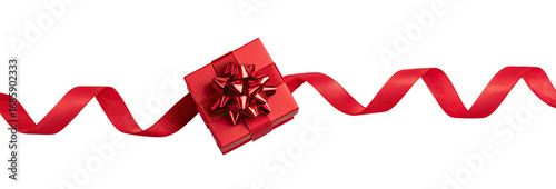 Red gift box with ribbon on black background