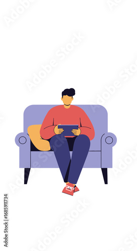 Relaxed man comfortably using tablet device while seated on sofa, enjoying leisure time at home