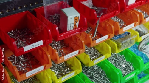 Organized Workshop with Color Coded Storage Bins in a Retro Analog Photobooth Warehouse in New Jersey