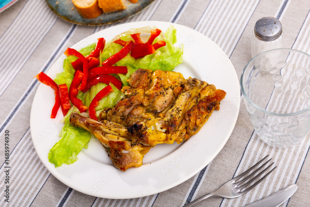 Fototapeta premium Delicious chicken meat with lettuce and bell pepper