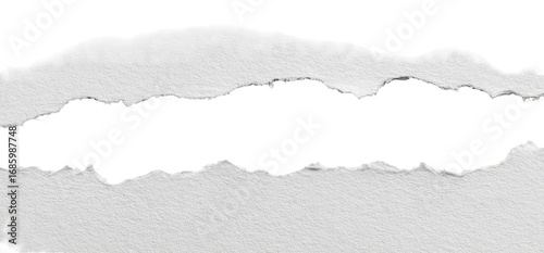 Ripped paper strip against a black background