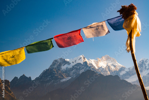 Prayer flags over Manaslu Peak