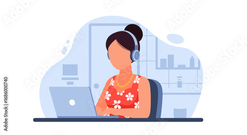 A professional woman wearing headphones uses a laptop for remote work, online learning, or virtual communication, symbolizing productivity and connection.