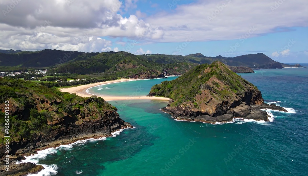 Fototapeta premium A high-angle, expansive view of a secluded bay, showcasing turquoise waters, a sandy beach, and lush greenery-covered hills.