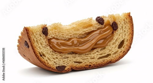 Slice of chocotone with dulce de leche for Christmas on a white background