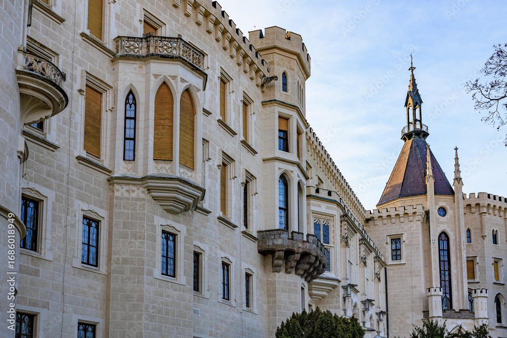Obraz premium Majestic european castle architecture with towers and gothic windows