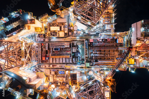 Wallpaper Mural Aerial top view of offshore jack up rig and offshore platform during sunset for oil and gas exploration and production. Torontodigital.ca