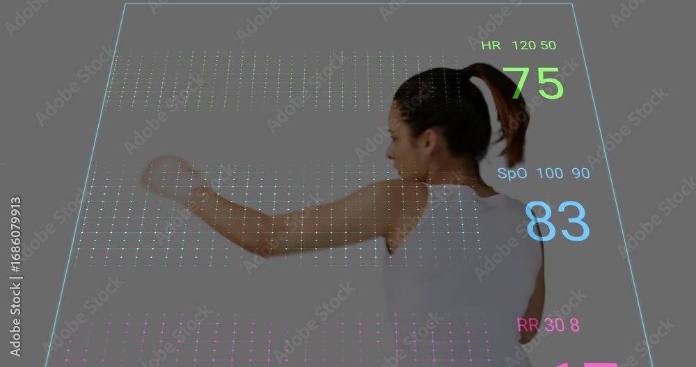 Female boxer throwing combos, activating 3D grid with vital sign ...