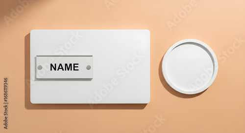 White name tag plate with circular tray on peach nameplate identification