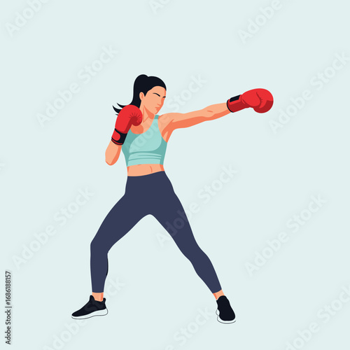A female boxer in a fighting stance, wearing athletic attire.