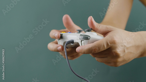Playing games with joystick control and fun. Online gaming concept. Playing video games with joystick.