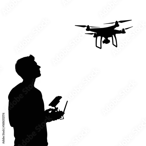 Silhouette of man operating drone with remote control against a white background in a studio shot